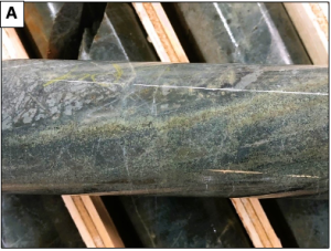 Examples of core from South Zone A) AXE-23-014: Fine disseminated pyrite-chalcopyrite-magnetite in brecciated intermediate volcanics and tuff beds at 740 m;